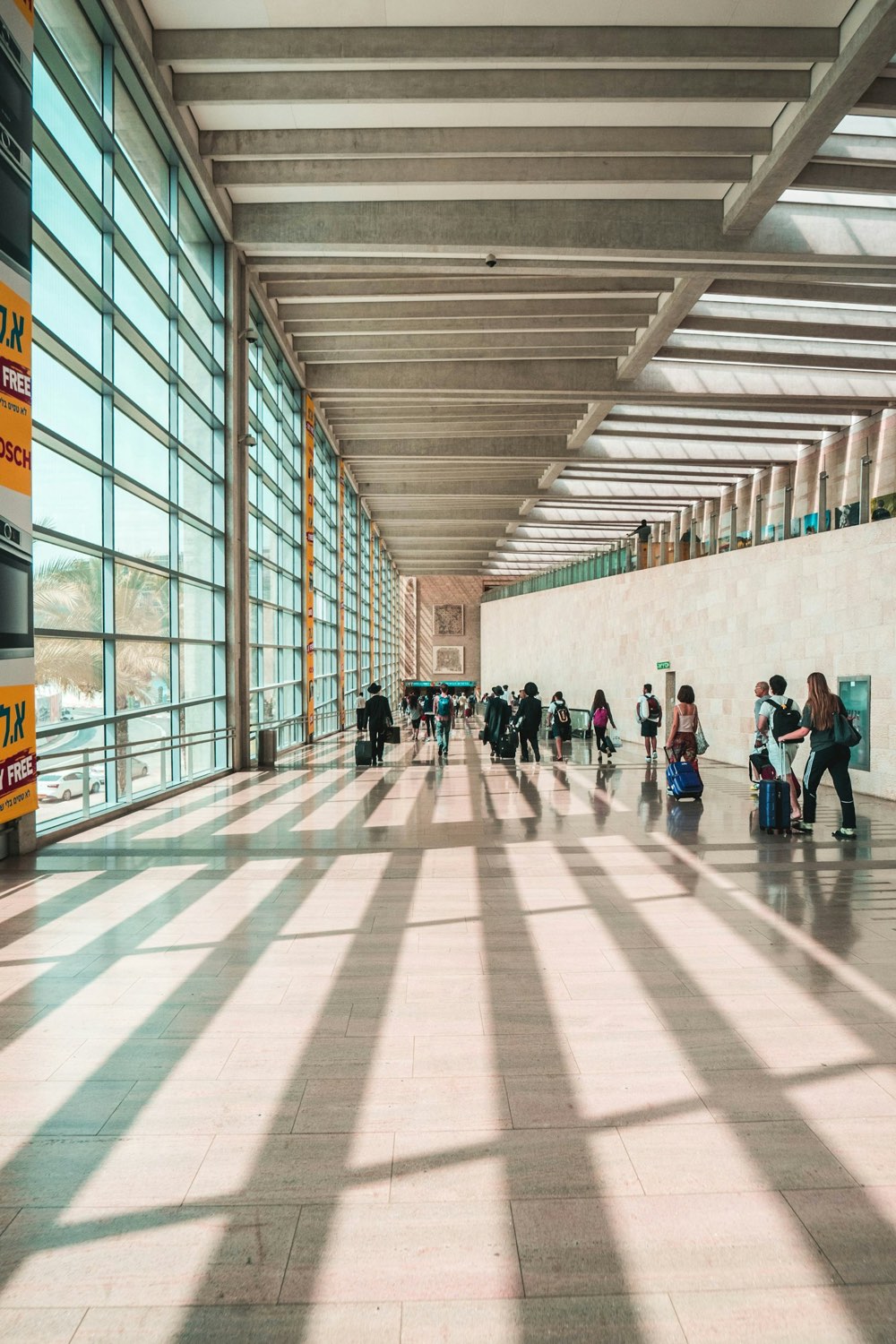 Passengers at an airport departure gate
